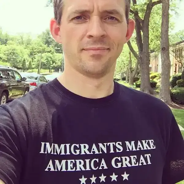 Paul Kittredge wearing an 'Immigrants Make America Great' t-shirt